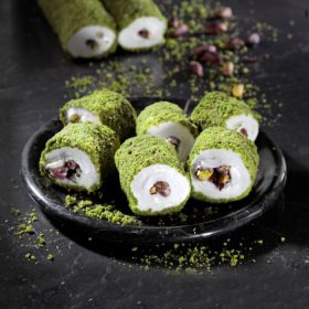 Pistache-dækket tyrkisk glæde med pistache